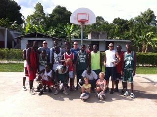 Aubry with his basketball team in Haiti.