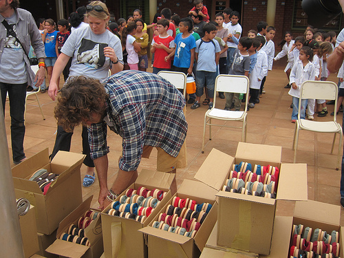 Blake Mycoskie unpacks a shipment of shoes for schoolchildren in Argentina Photo courtesy of andysternberg.